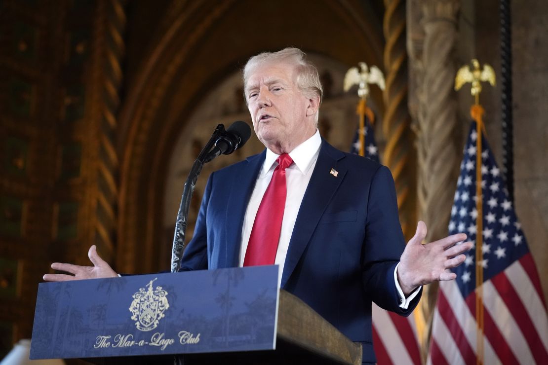 Former President Donald Trump speaks to reporters at his Mar-a-Lago estate in Palm Beach, Florida, on August 8, 2024.