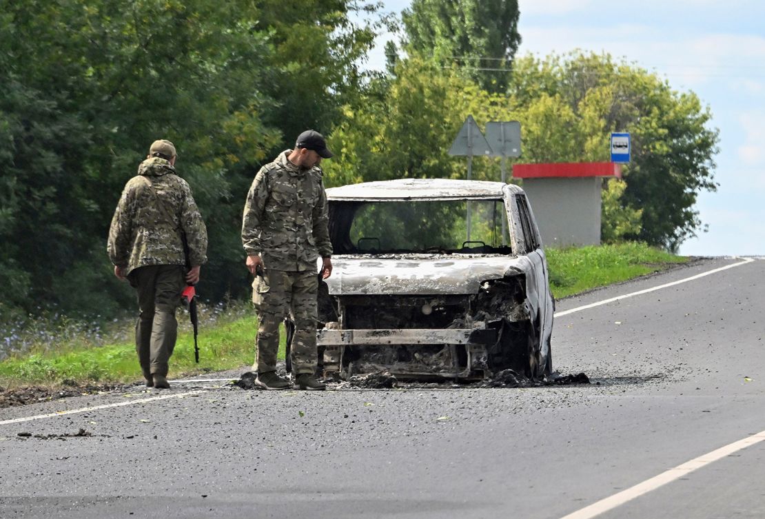 A burnt-out car is seen on the highway between Kursk and Sudzha on August 9, 2024.