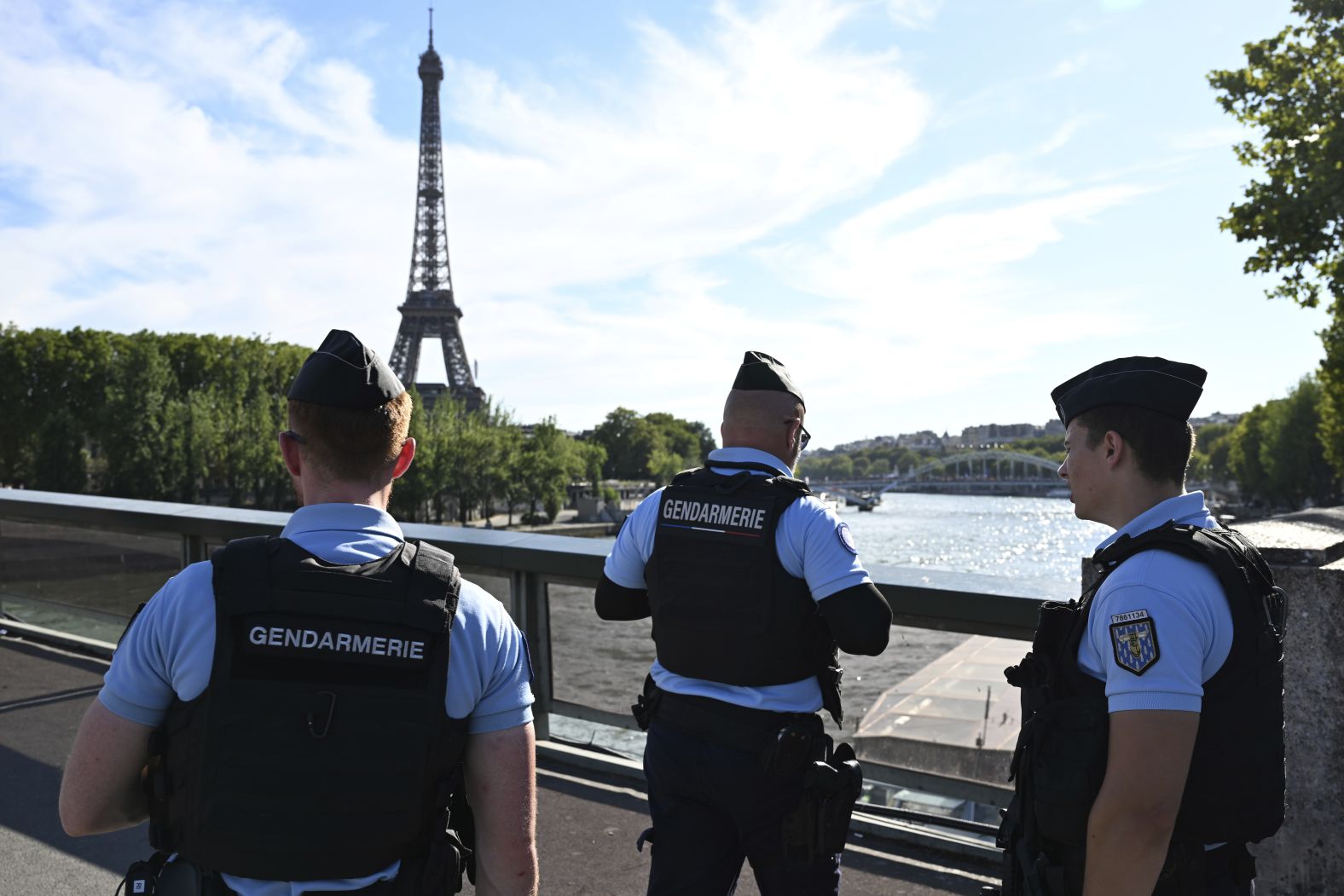 Security forces patrol the area near the Eiffel Tower.