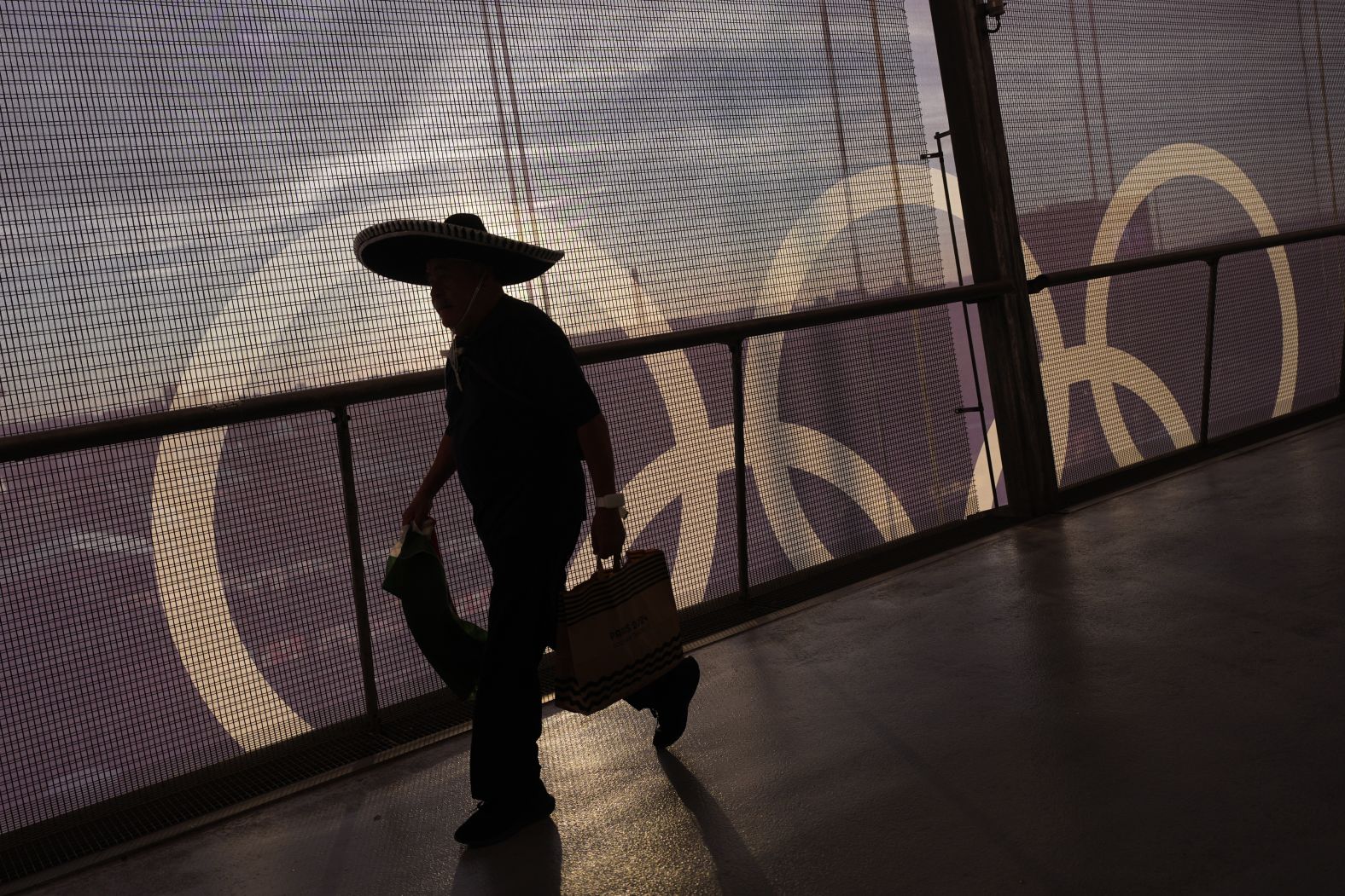 A spectator arrives at the Stade de France.