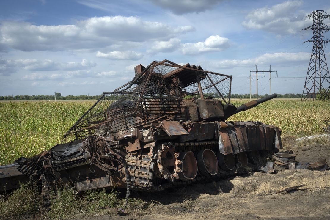 A destroyed Russian tank lies on a roadside near Sudzha in the Kursk region of Russia. This image was approved by the Ukrainian Defense Ministry before publication. (AP Photo)