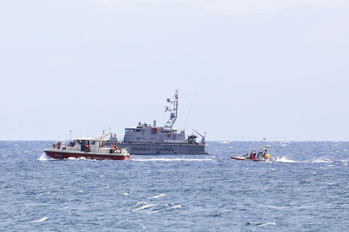 Emergency teams search for victims after the boat went missing off Sicily's coast on August 19.