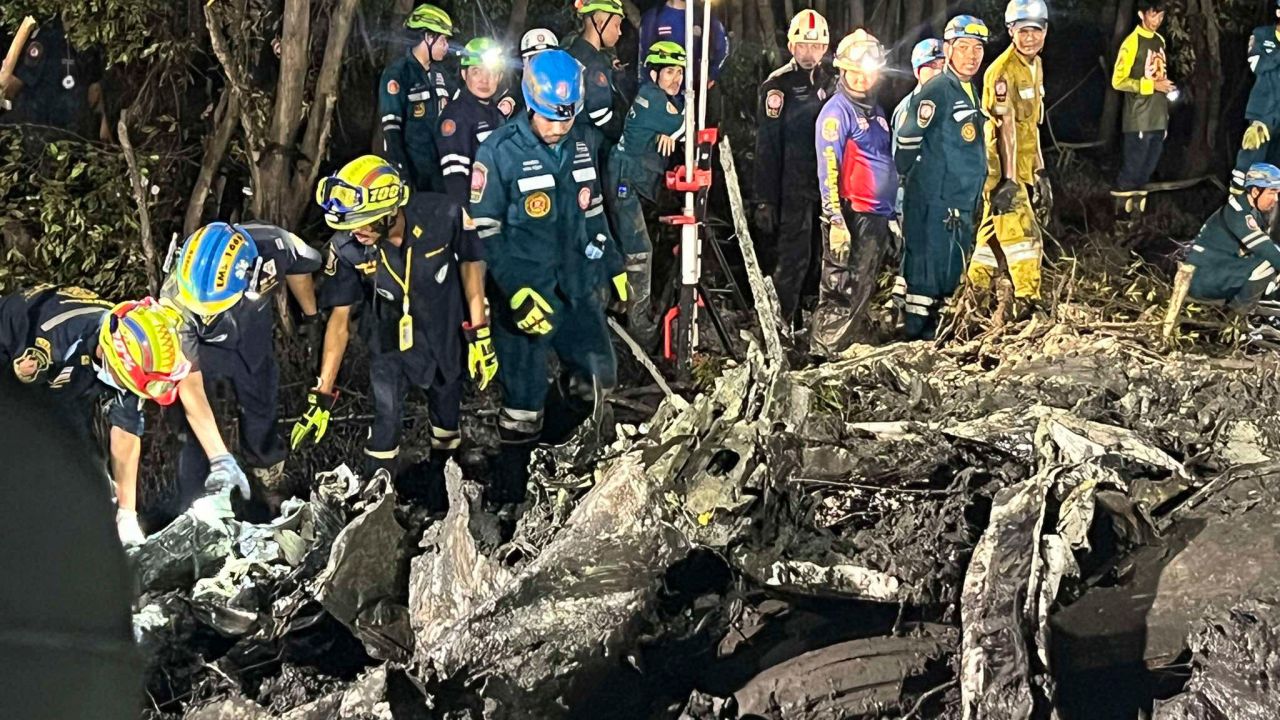 A rescue team works at a site of a small aircraft crash in Chachoengsao province, Thailand, on August 22, 2024.