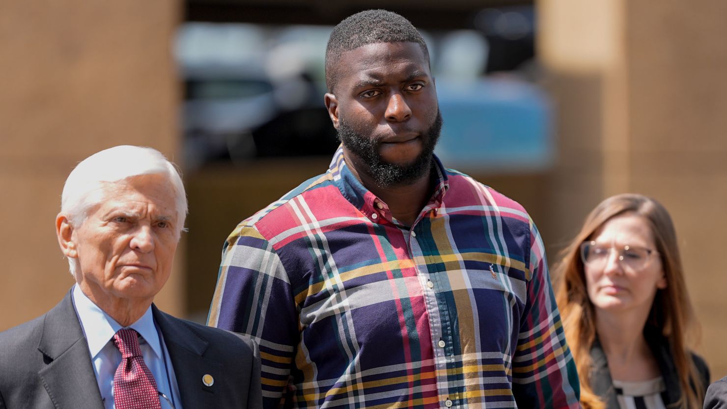 Emmitt Martin III, a former Memphis Police Department officer, second from left, accused of killing Tyre Nichols, walks into federal court in August.