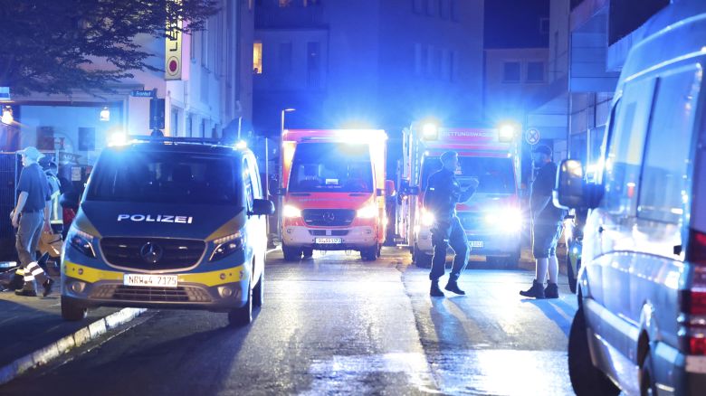 Police and ambulances near the scene where people were killed and injured in an attack at a festival in Solingen, western Germany, the German dpa news agency reported, Friday, Aug. 23, 2024. (Gianni Gattus/dpa via AP)