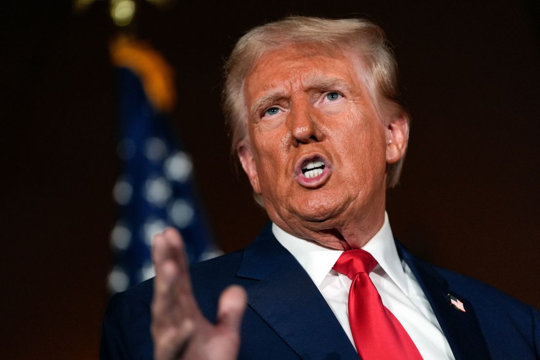 Former President Donald Trump talks with reporters at a campaign event at ll Toro E La Capra, on August 23, 2024, in Las Vegas.