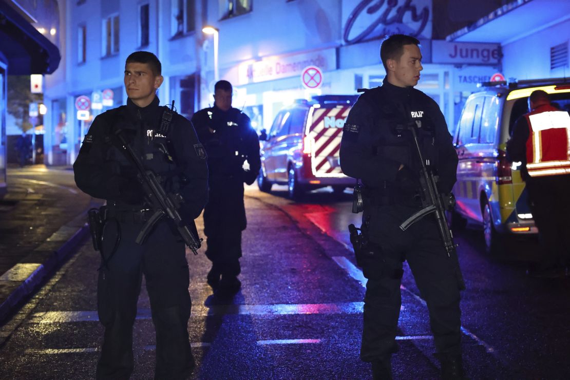 Police and ambulances near the scene where people were killed and injured in an attack on a folk festival in Solingen.