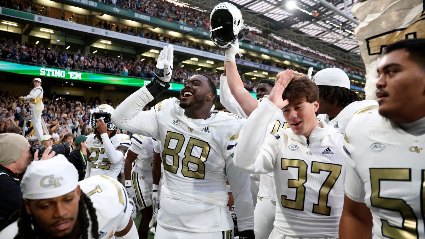 Georgia Tech Yellow Jackets players celebrate after upsetting the No. 10 Florida State Seminoles at Aviva Stadium in Dublin.