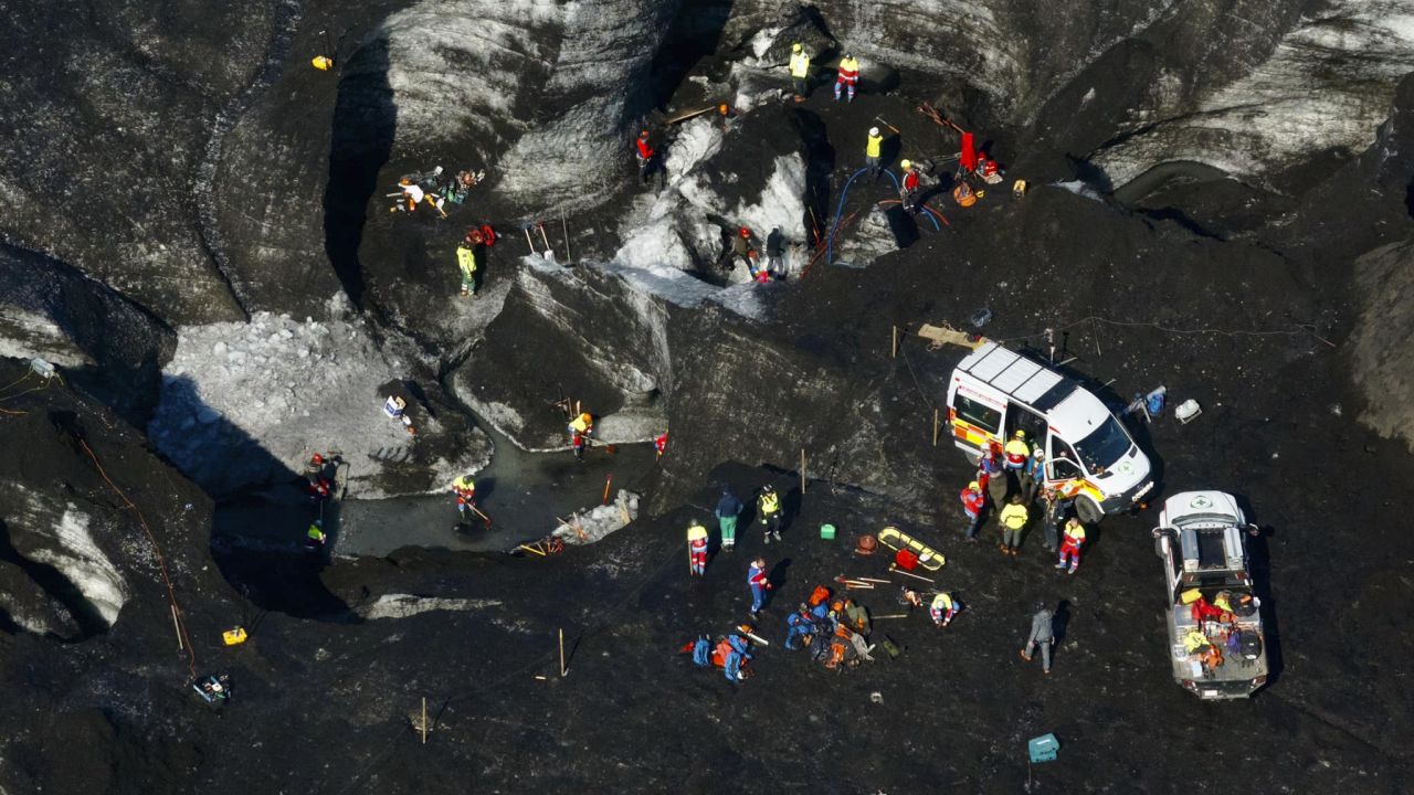 Rescue teams work at the scene after an ice cave partially collapsed, at the Breidamerkurjokull glacier, in southeastern Iceland, on Augist 26, 2024.