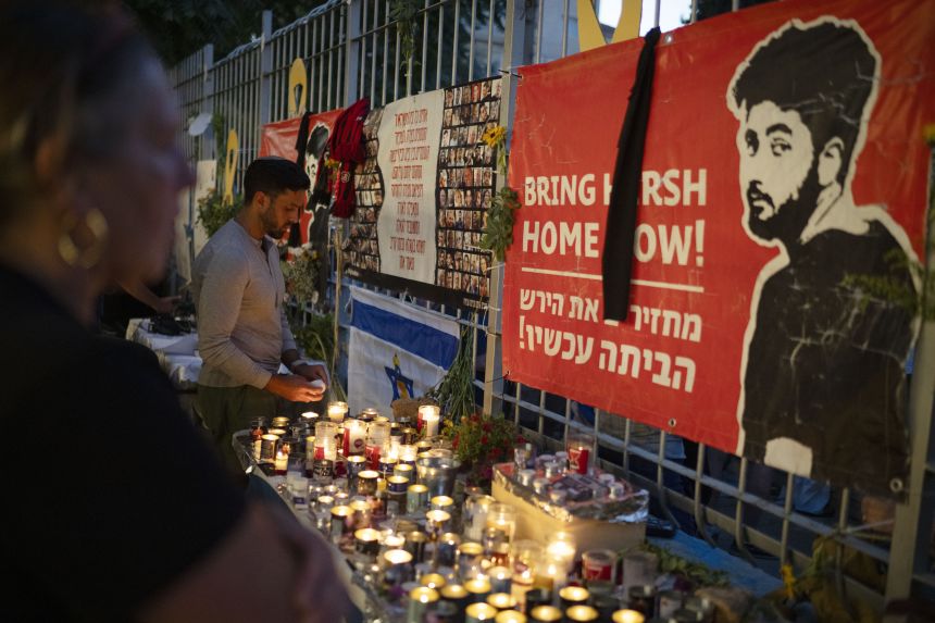 People light candles during a vigil in memory of Hersh Goldberg-Polin in Jerusalem on September 1, 2024.