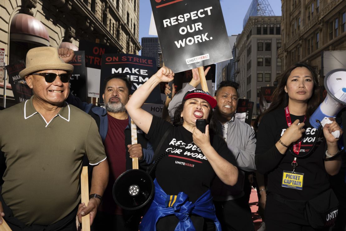 A group marches in support of hotel workers near San Francisco's Union Square on September 2.