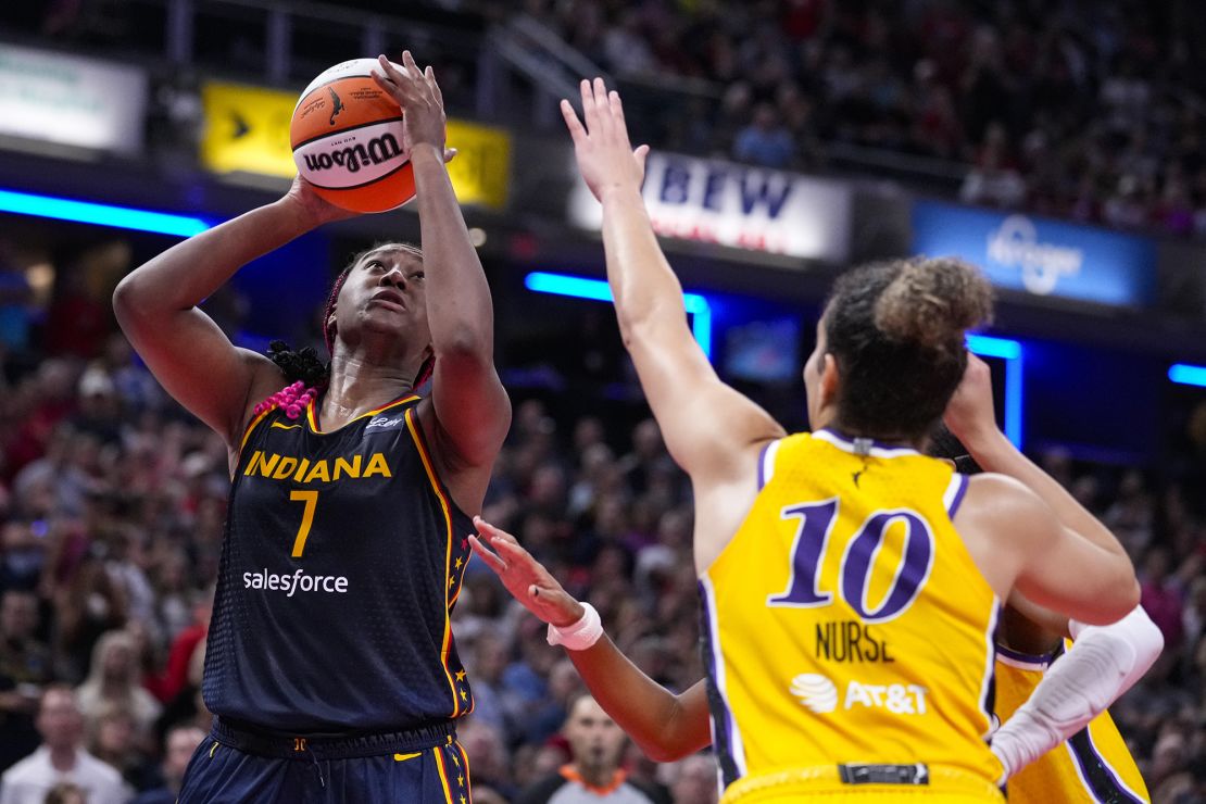 Boston shoots over Sparks guard Kia Nurse.