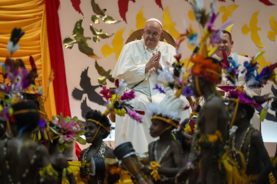 Pope Francis attends a traditional dance performed by the Caritas Technical Secondary School pupils in Port Moresby on Saturday.