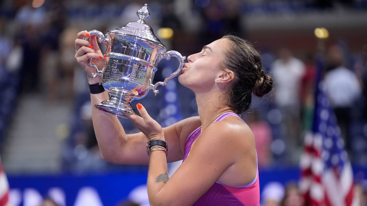 Aryna Sabalenka kisses the trophy after winning the US Open for the first time.