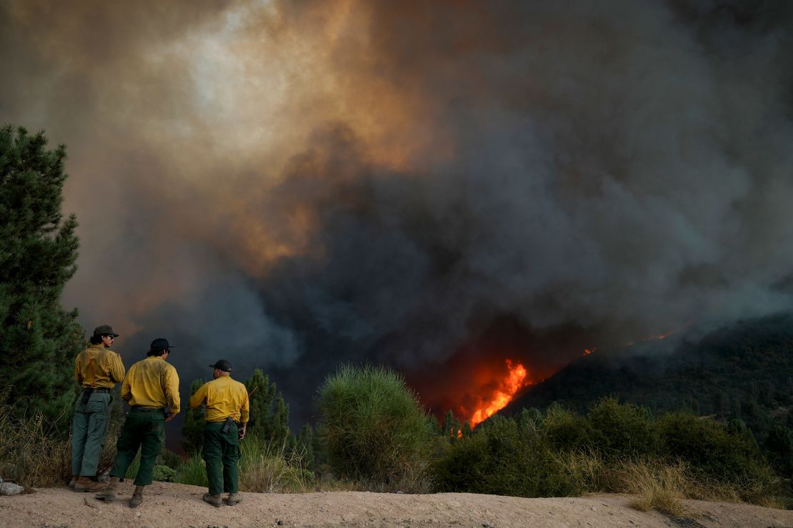 Firefighters monitor the Line Fire in Running Springs, California, on September 7, 2024.