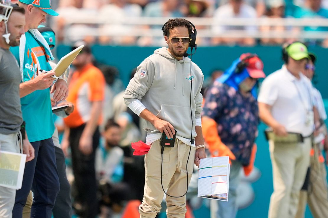 Miami Dolphins head coach Mike McDaniel watches his team from the sidelines.