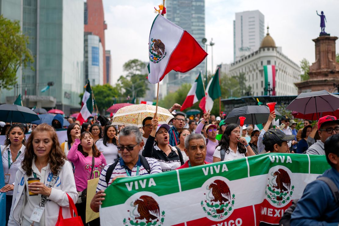 Judicial workers protest the government's proposed reform, which would make judges stand for election, on Tuesday.