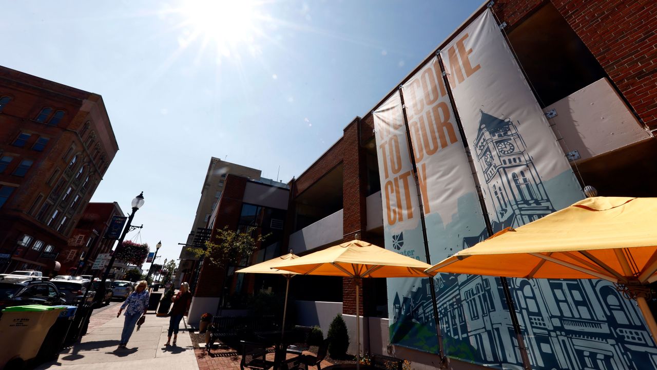 Pedestrians walk down Fountain Avenue in Springfield, Ohio, Wednesday, Sept. 11, 2024. (AP Photo/Paul Vernon)