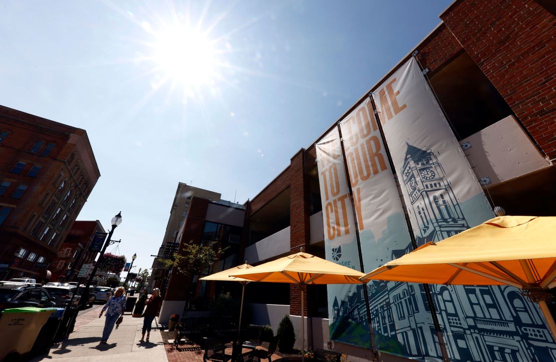 Pedestrians walk down Fountain Avenue in Springfield, Ohio, on Wednesday, September 11.