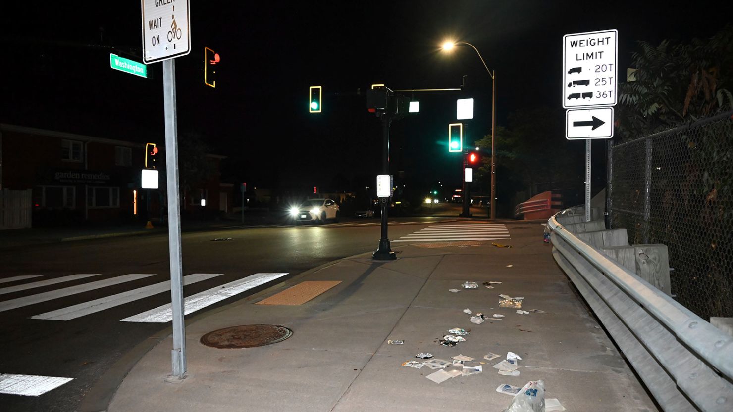 Blood, medical debris and crime scene tape mark the scene of a shooting Thursday in Newton, Massachusetts.