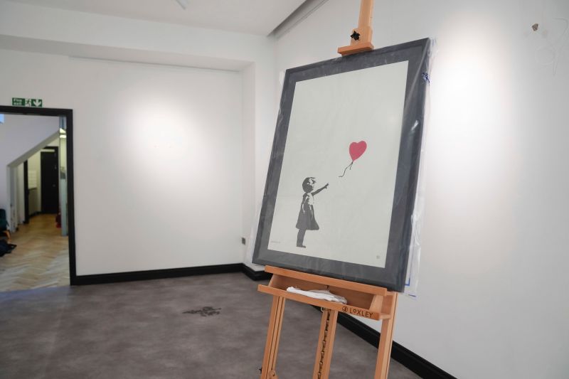 Man jailed for stealing Banksy's 'Girl with Balloon' print in