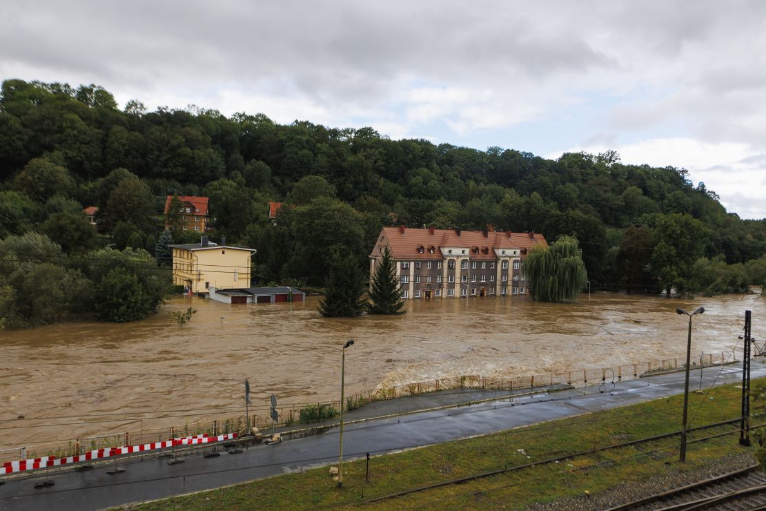 Garages and a house flooded in the town of K?odzko, in Poland's southwest, Sunday, Sept. 15, 2024, after days of unusually heavy rain.