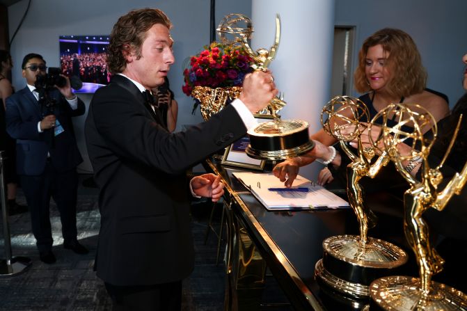 Jeremy Allen White picks up his engraved Emmy after he won for outstanding lead actor in a comedy series ("The Bear").