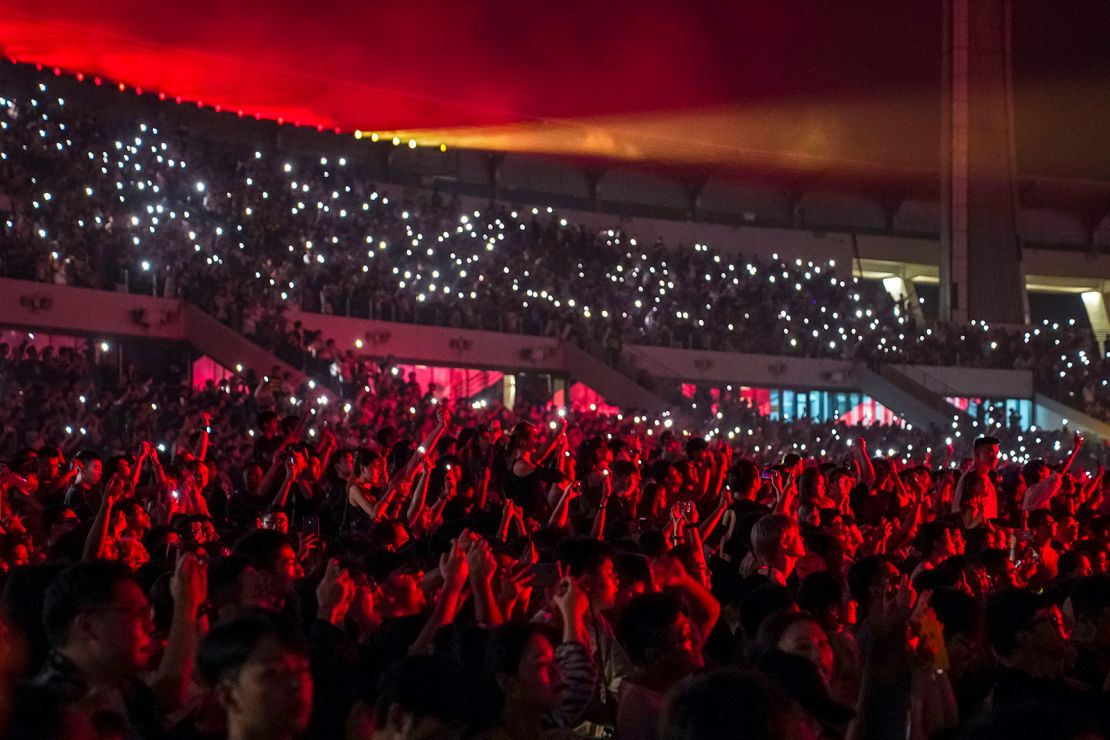 Music fans cheer during Kanye West's Vultures Listening Experience at Wuyuan River Stadium on September 15, 2024.