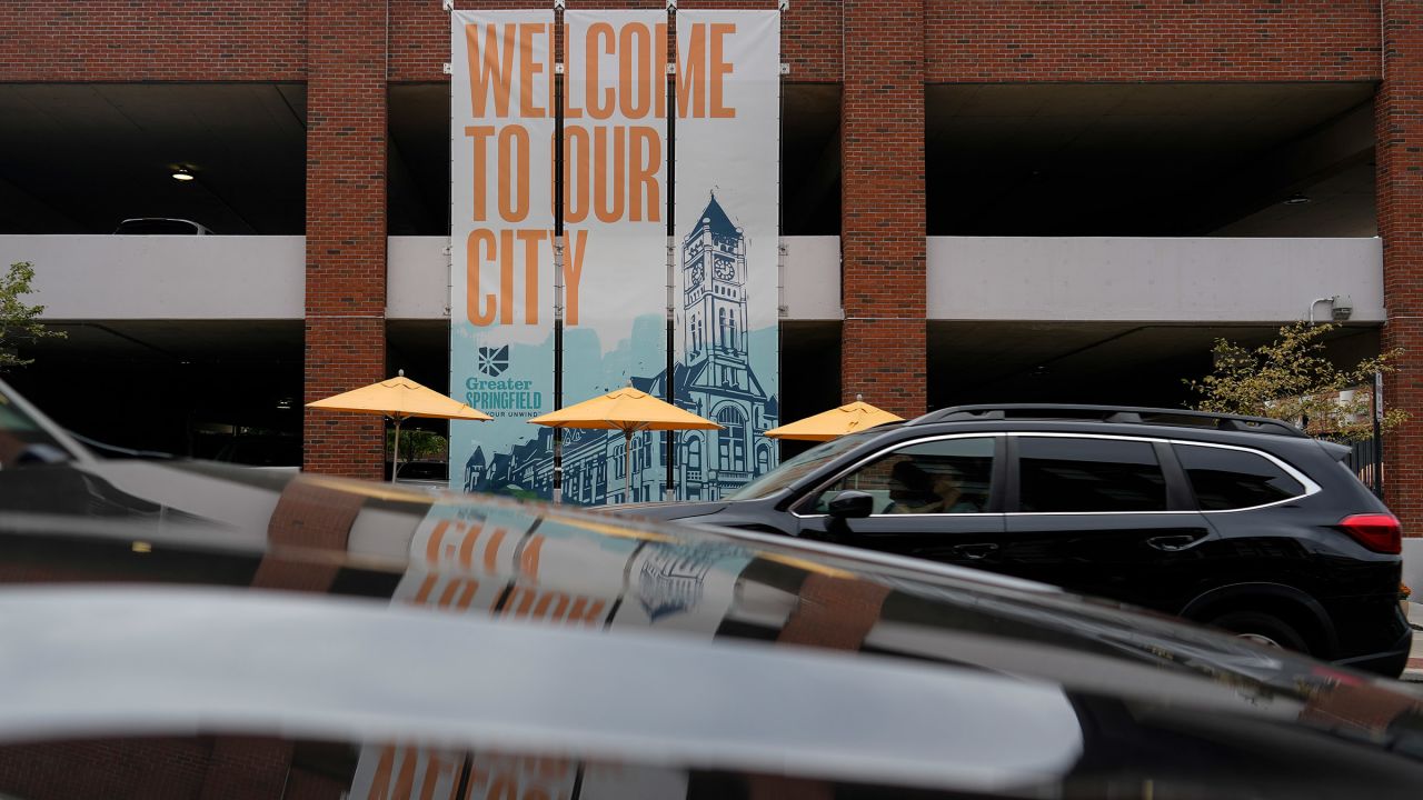 A banner with the images of the Heritage Center of Clark County and "Welcome To Our City," hangs along North Fountain Ave. in Springfield, Ohio, on September 17, 2024.