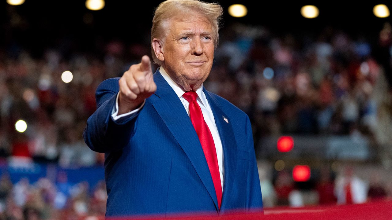 Republican presidential nominee former President Donald Trump points to supporters as he arrives to speak at a campaign event at Nassau Coliseum, Wednesday, Sept.18, 2024, in Uniondale, N.Y. (AP Photo/Alex Brandon)