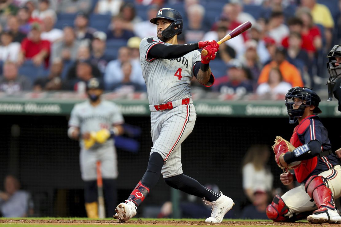 Minnesota Twins shortstop Carlos Correa hits a single against the Cleveland Guardians on September 18th.