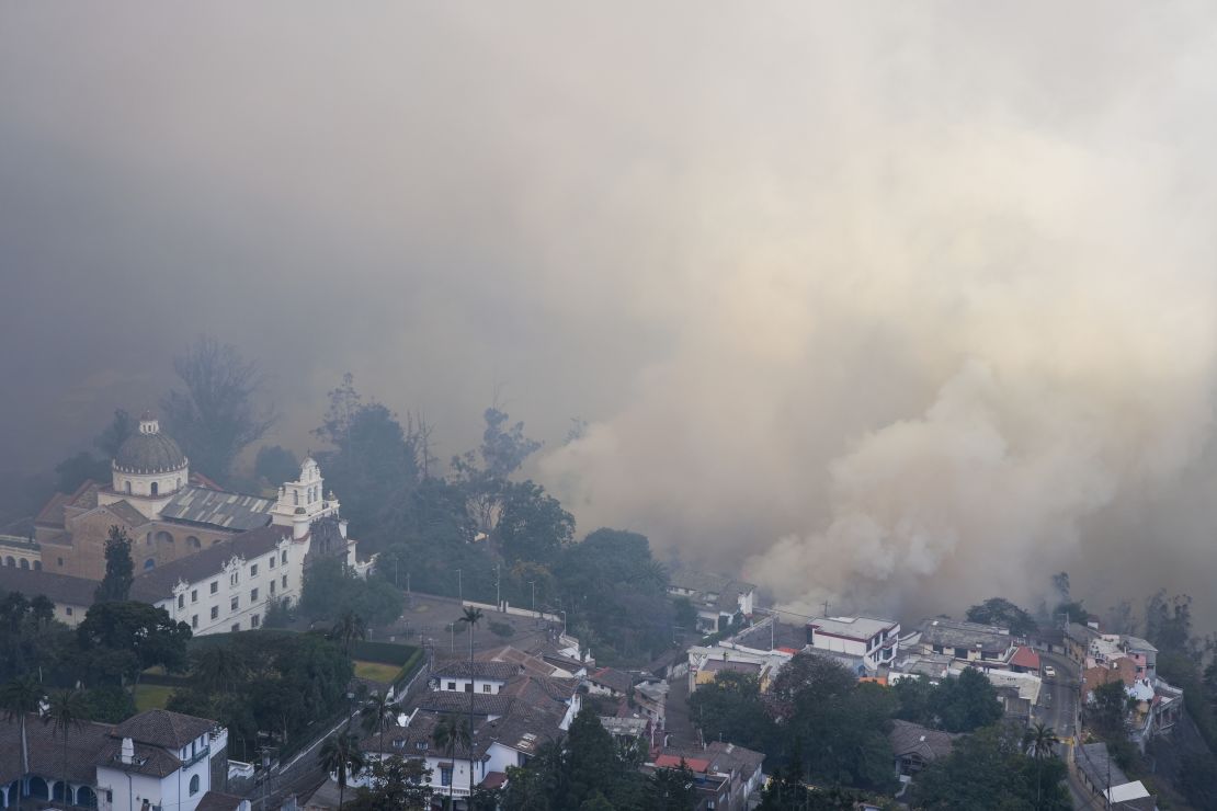 Smoke rises from fires in the Guapulo neighborhood of Quito, Ecuador, on Sept. 24, 2024.