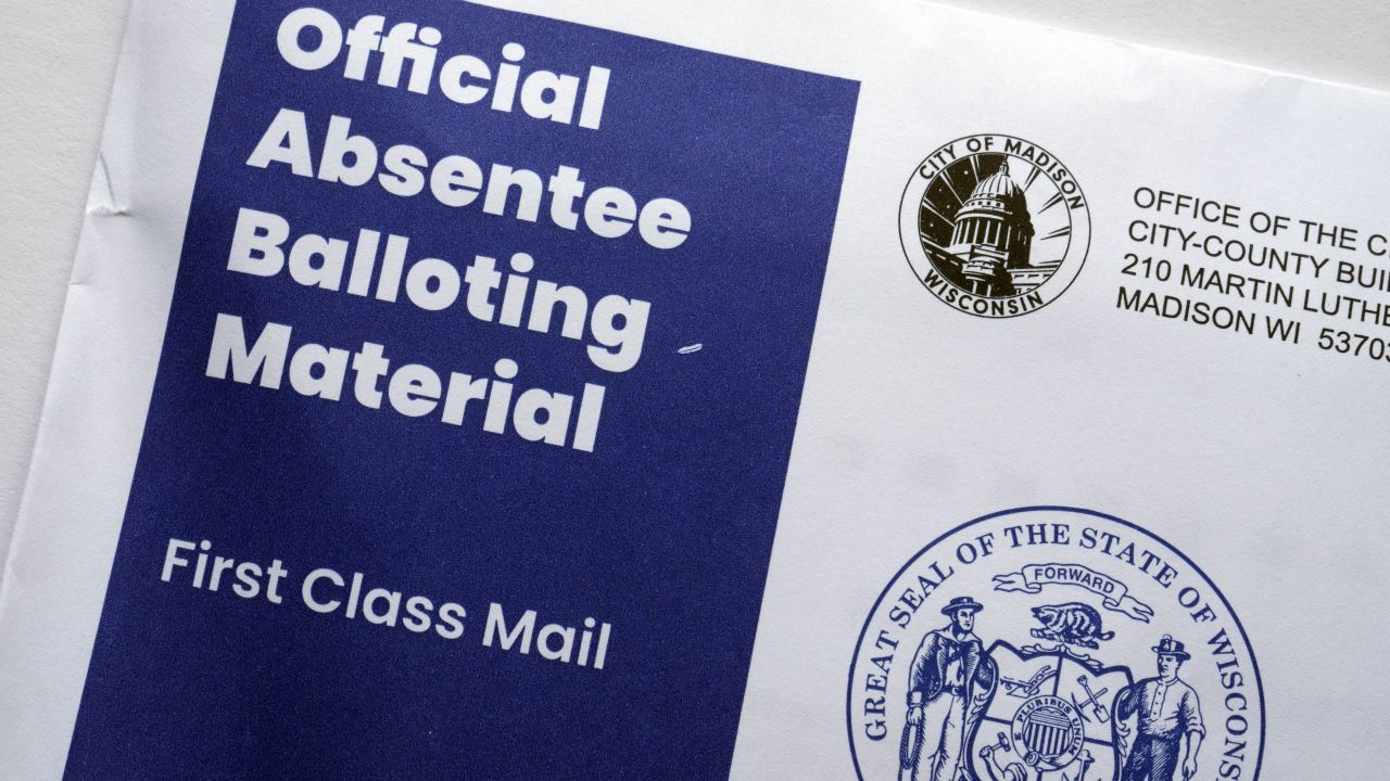 The outer envelope containing official absentee balloting material for the Wisconsin November 2024 General Election ballot is photographed In Madison, Wis., Sept. 21, 2024. (AP Photo/Jon Elswick)