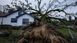 A damaged 100-year-old home is seen after an Oak tree landed on it after Hurricane Helene moved through the area Friday, Sept. 27, 2024, in Valdosta, Ga. (AP Photo/Mike Stewart)