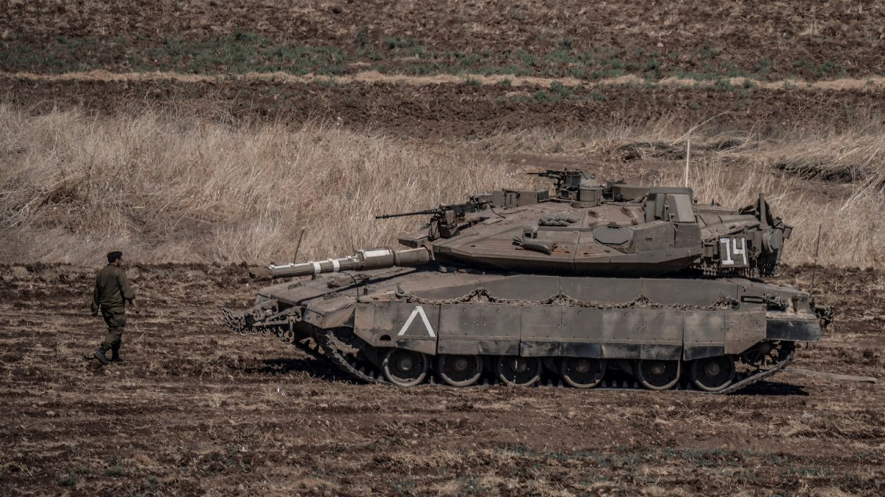 Israeli military tanks gather by the Israeli-Lebanon border on September 28.