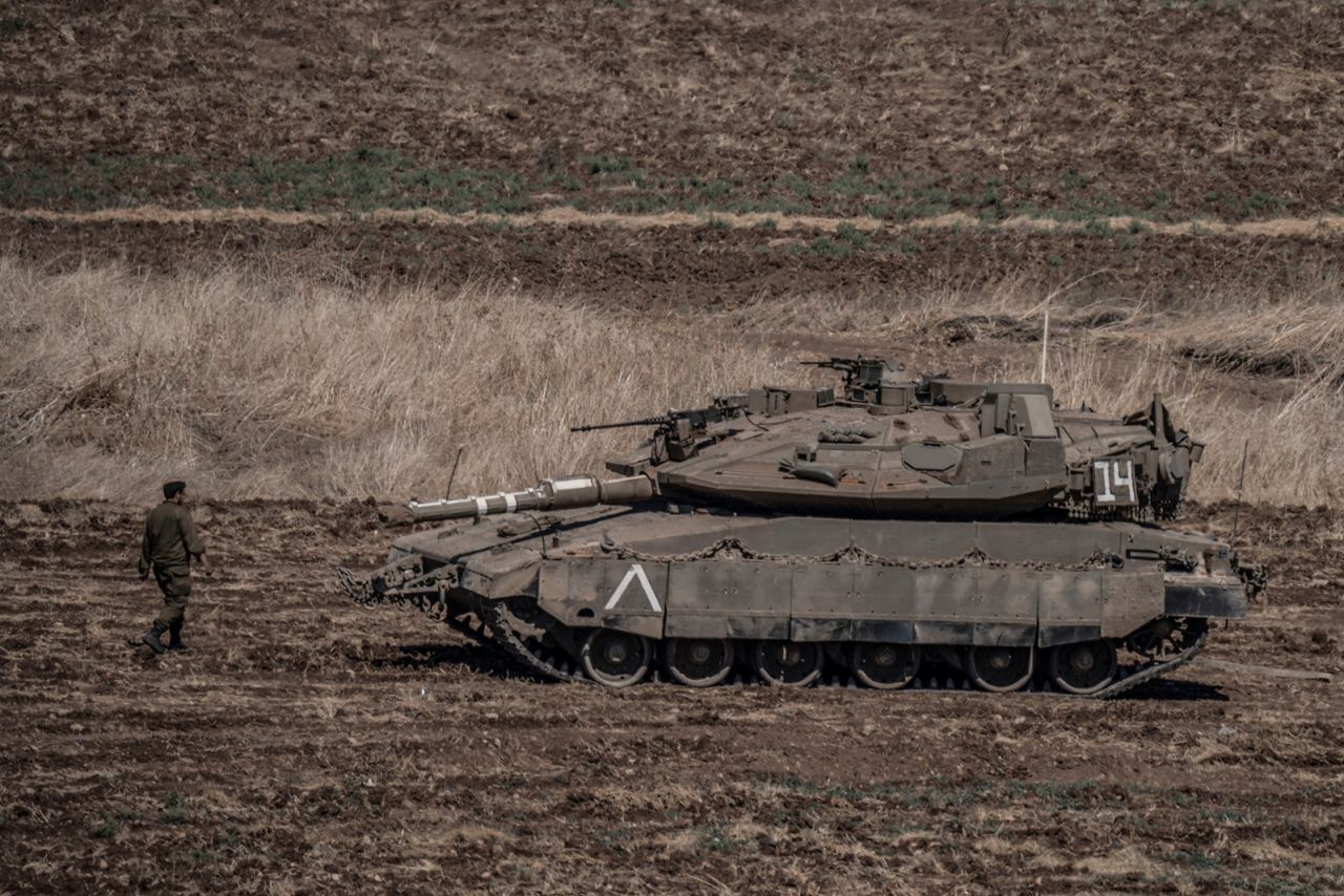 Israeli military tanks gather by the Israeli-Lebanon border on September 28.