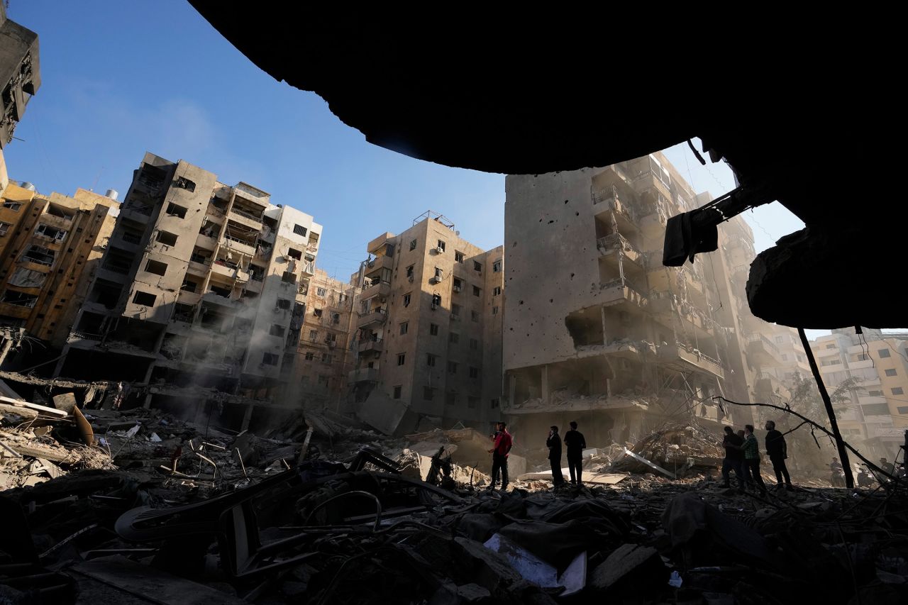 People gather at the site of the assassination of Hezbollah leader Hassan Nasrallah in the southern suburbs of Beirut, Lebanon, on September 29, 2024.