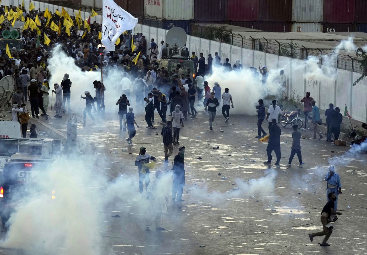 Police fire tear gas to disperse people during a protest against Israel’s killing of Hezbollah leader Hassan Nasrallah near the US consulate in Karachi, Pakistan, on September 29.