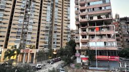 Damaged apartments, right, are seen in a building that was hit by Israeli strike, in Beirut, Lebanon, early Monday, September 30, 2024.