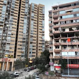 Damaged apartments, right, are seen in a building that was hit by Israeli strike, in Beirut, Lebanon, early Monday, September 30, 2024.