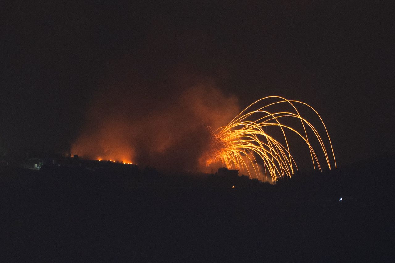 Israeli shelling hits an area in southern Lebanon as seen from northern Israel, Monday, September 30.