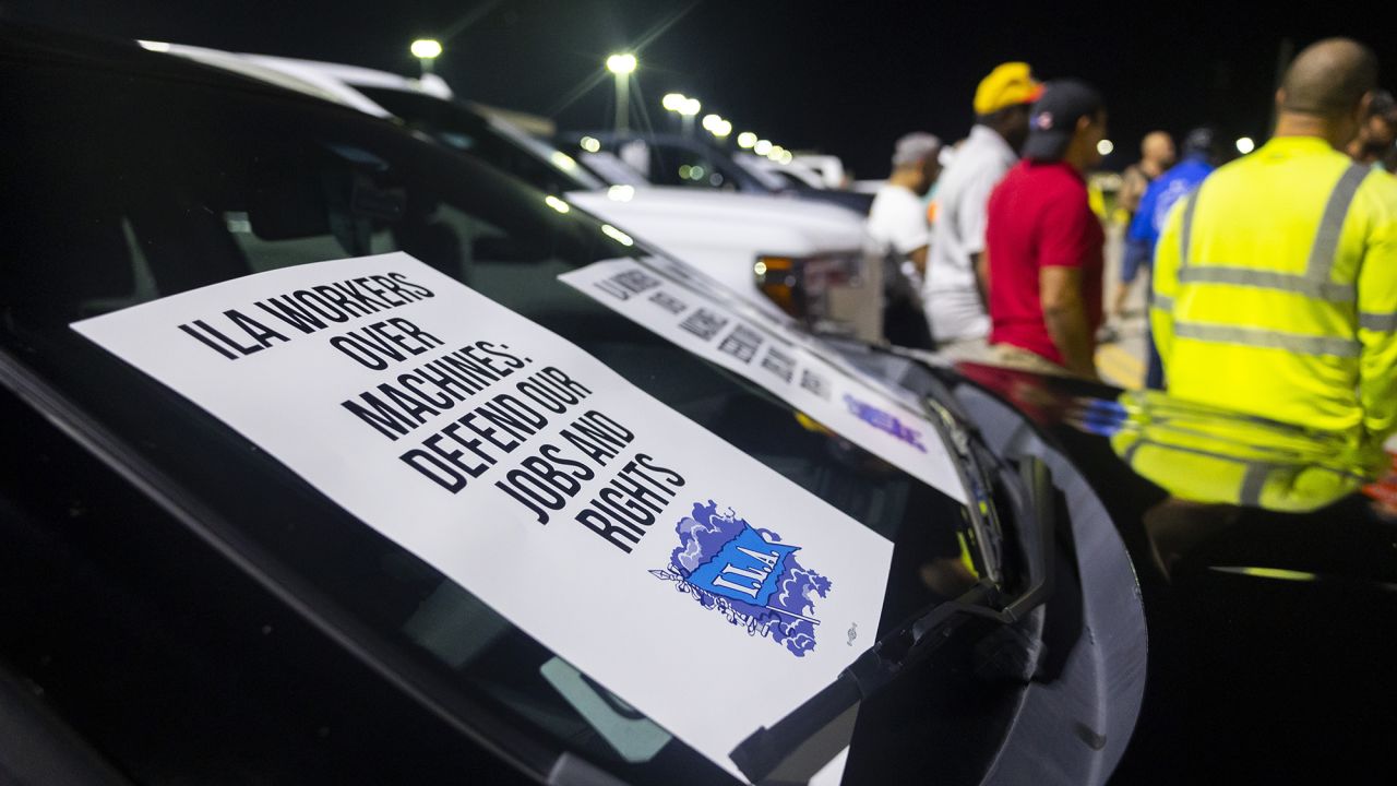 Longshoremen strike at midnight at Bayport Terminal on October 1 in Houston, Texas.