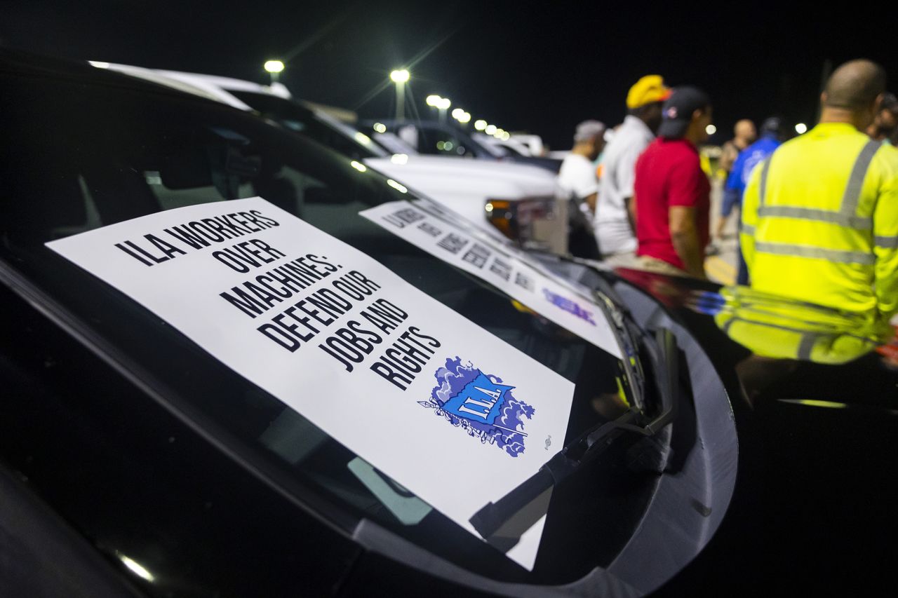 Longshoremen strike at midnight at Bayport Terminal on October 1 in Houston, Texas.