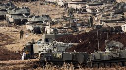 Israeli soldiers work on tanks at a staging area in northern Israel near the Israel-Lebanon border, Tuesday, Oct. 1, 2024. (AP Photo/Baz Ratner) Israeli soldiers work on tanks at a staging area in northern Israel near the Israel-Lebanon border, Tuesday, Oct. 1, 2024. (AP Photo/Baz Ratner)
