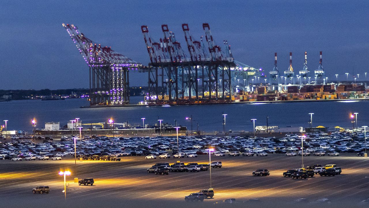 Cranes and shipping containers are seen at Port Newark during a port strike, on Tuesday, October 1 in Bayonne, New Jersey.