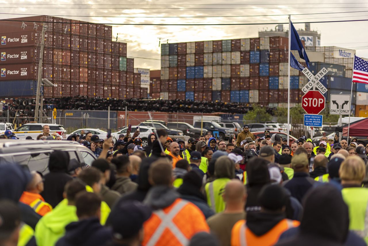 Workers take part in a port strike at Port Newark today in Bayonne, N.J.