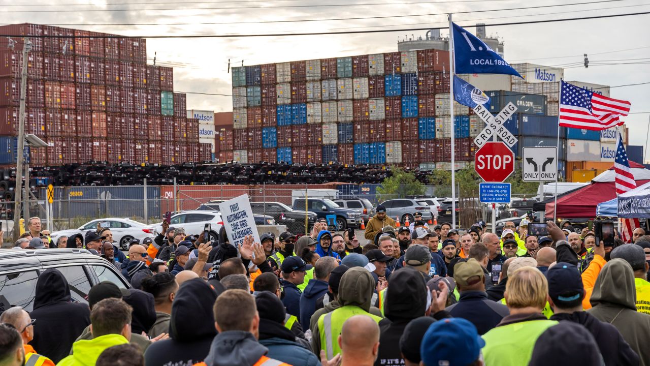 Workers take part in a port strike at Port Newark in New Jersey on Tuesday.  Tuesday.