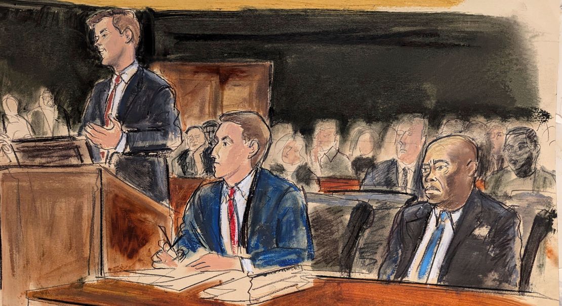 Assistant US Attorney Hagen Scotten speaks in Manhattan federal court, as attorney Alex Spiro, center, and New York City Mayor Eric Adams, right, look on Wednesday.