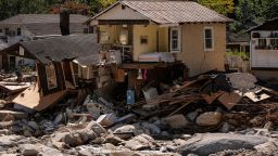 Homes are seen in the aftermath of Hurricane Helene, Wednesday, Oct. 2, 2024, in Chimney Rock Village, N.C. (AP Photo/Mike Stewart)