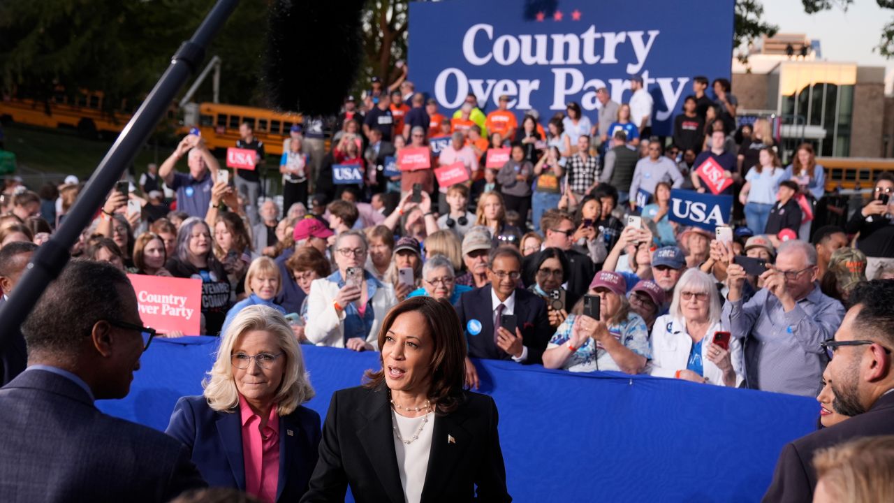 Kamala Harris, right, and Liz Cheney, greet attendees during a campaign event at Ripon College in Ripon, Wisconsin, on October 3.